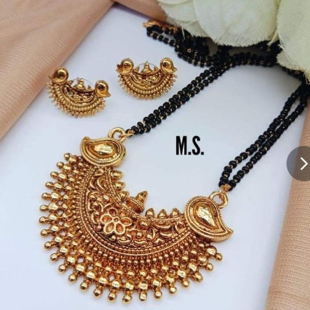 Traditional mangalsutra with half moon pendant