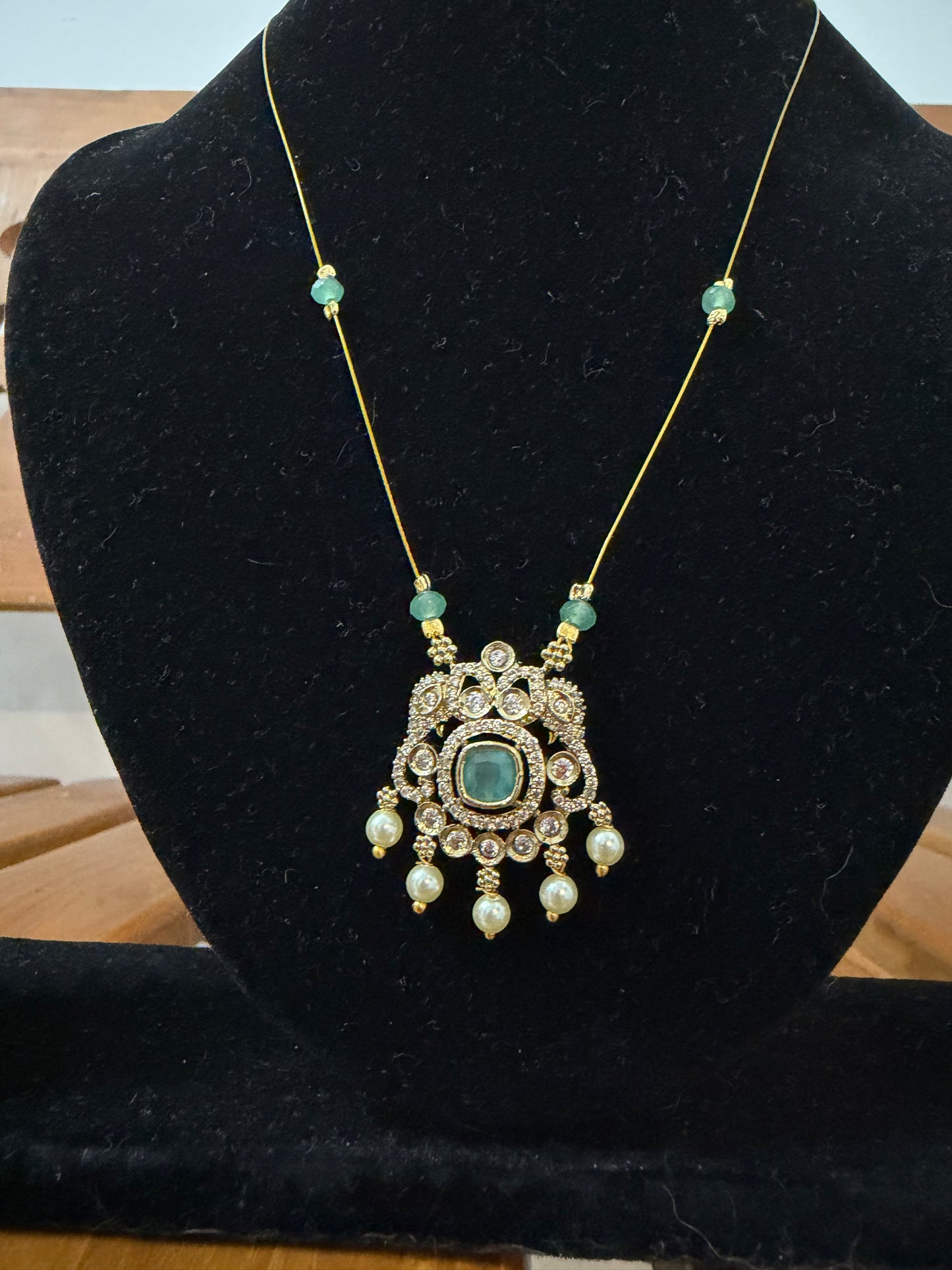 Invisible necklace with Mint green locket