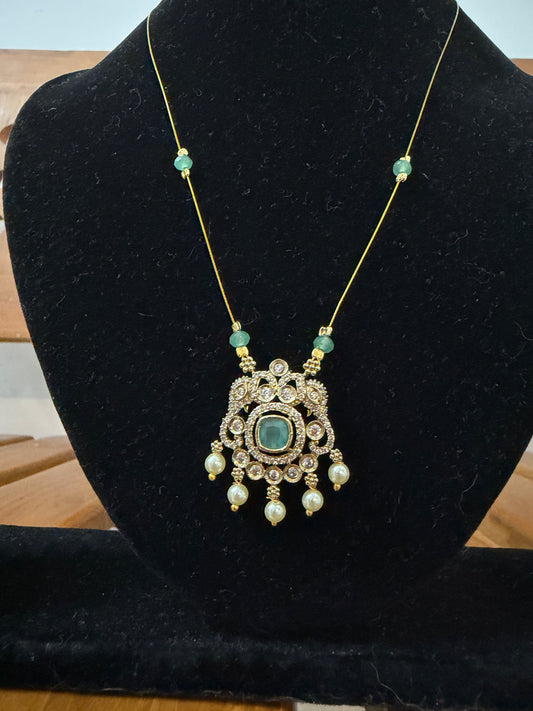 Invisible necklace with Mint green locket