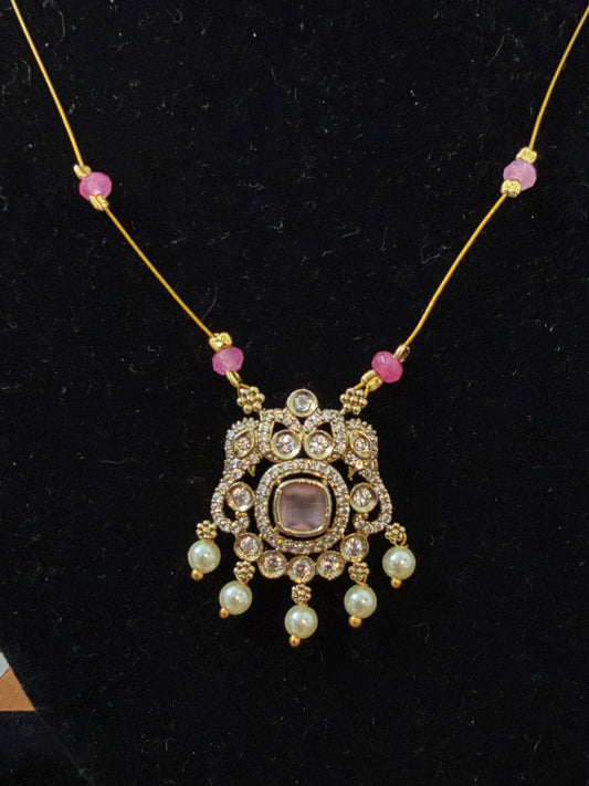 Invisible necklace with pastel soft pink stone
