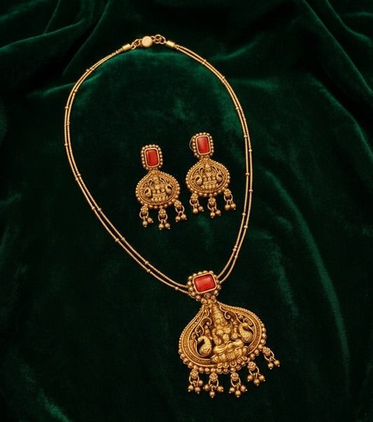 Antique Gold Lakshmi Pendant Necklace Set with Coral Red Stones – Traditional Temple Jewelry