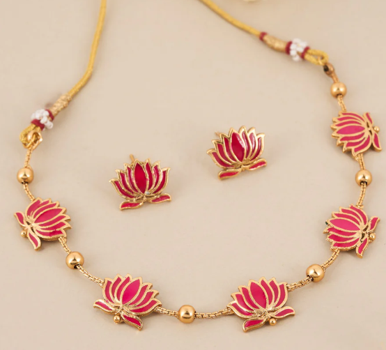 Lotus Choker with Matching Studs – Lightweight Daily & Party Wear: gold‑polish floral design with matching studs. Lightweight, festive, and perfect for weddings or gifting. Shop now at Saanvi Jewels.
