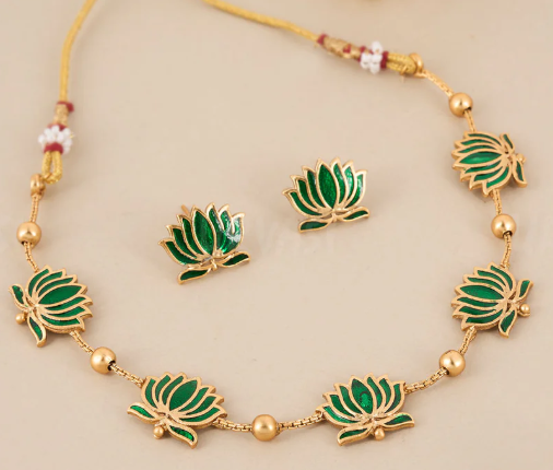 Lotus Choker with Matching Studs – Lightweight Daily & Party Wear: gold‑polish floral design with matching studs. Lightweight, festive, and perfect for weddings or gifting. Shop now at Saanvi Jewels.