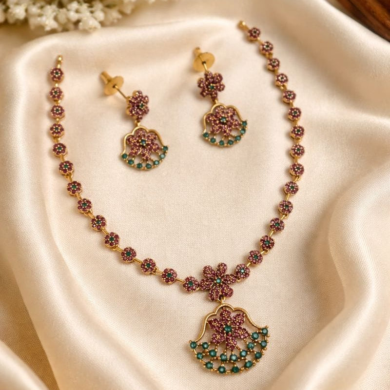 Floral Temple Necklace Set with Ruby & Emerald Stones I Saanvi by Rajani GJ6860