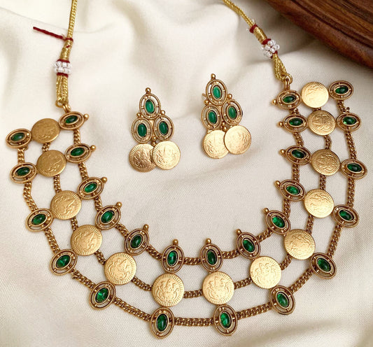 South Indian Temple Jewelry Set | Gold Plated Coin Necklace with Green Kemp Stones: Antique Matte Gold Coin Choker Set with Emerald Green Stones – Double Layer Temple Jewelry