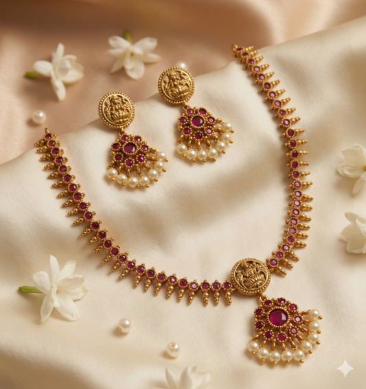 Traditional Antique Matte Gold Temple Jewelry Set with Ruby Red Kemp Stones & Pearl Drops – Lakshmi Motif Short Necklace & Earrings for Wedding & Festive Wear