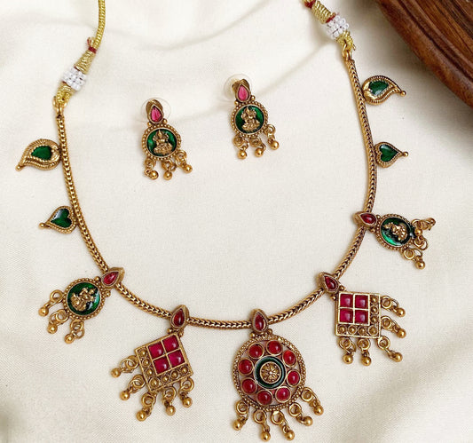 Antique Gold Finish Kemp Necklace Set | Traditional Temple Jewellery with Red & Green Stones & Goddess Motifs